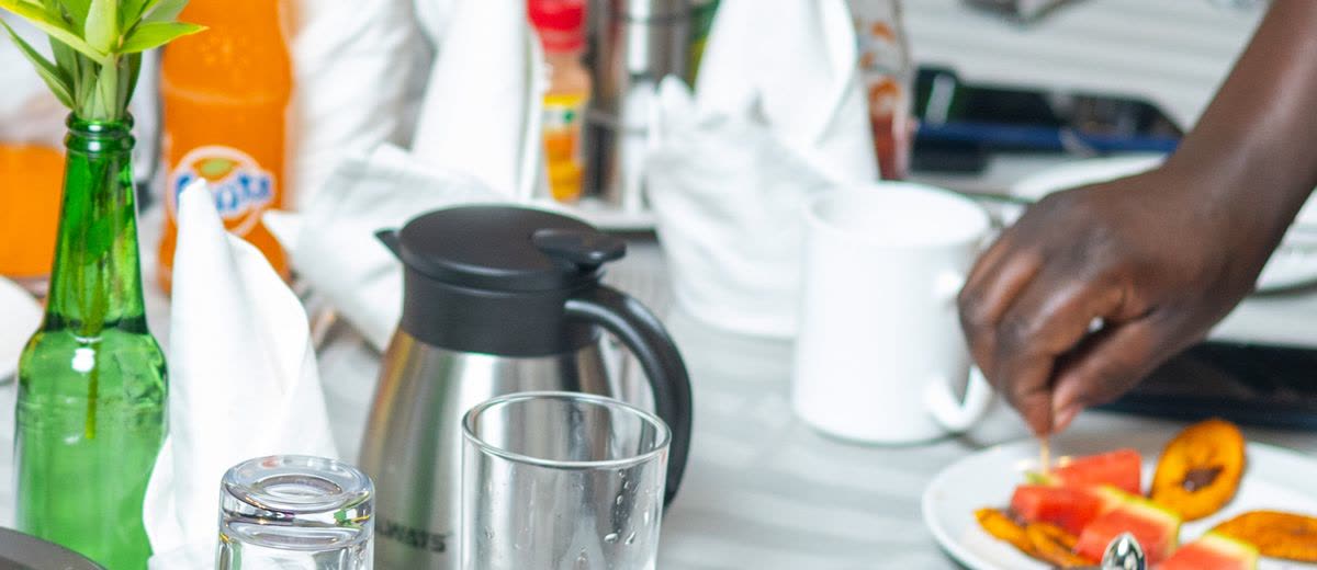 Tea served at a table with flasks and cups