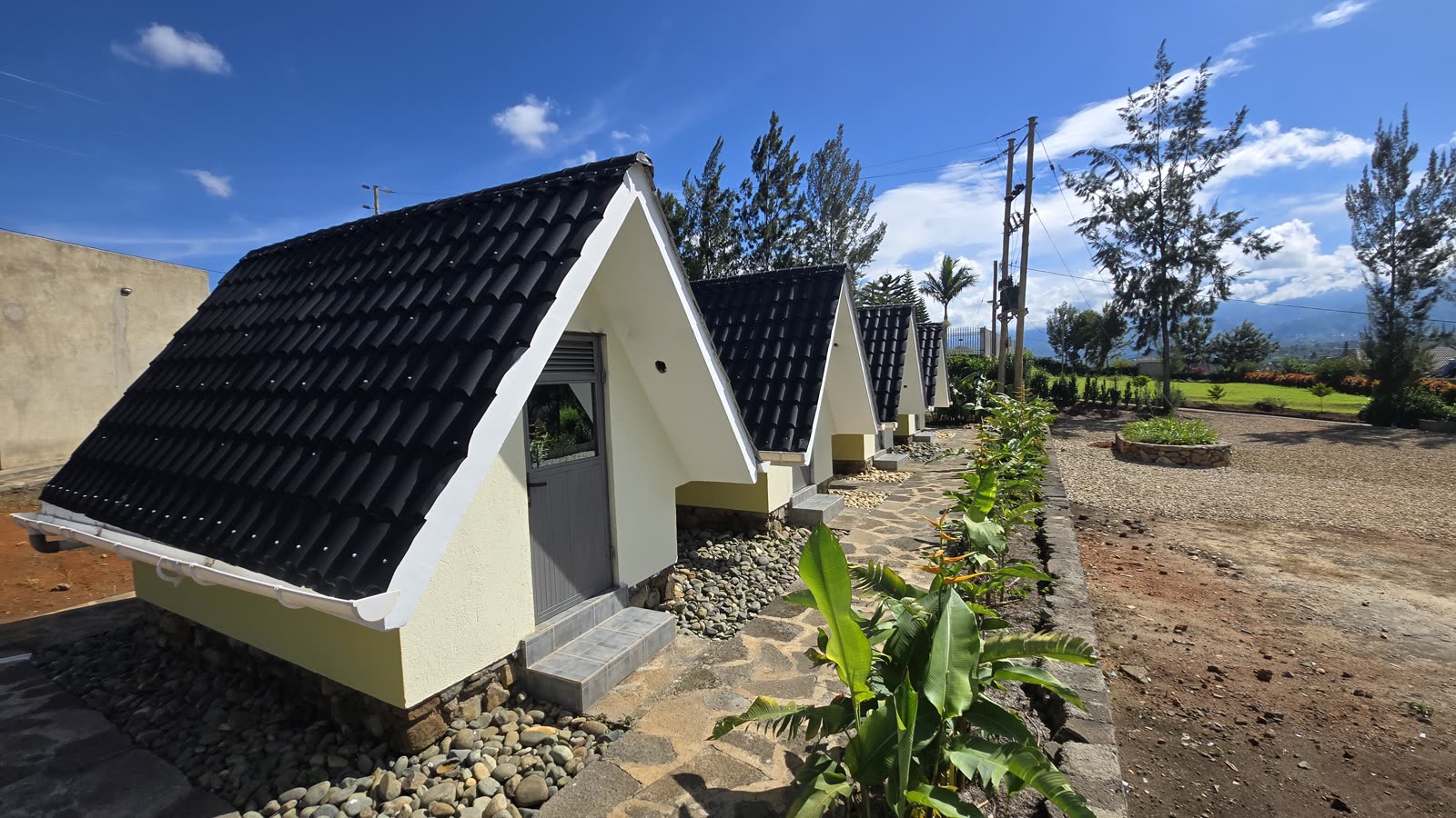 The A-frame studios under a blue sky